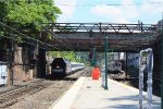    The 1:34 PM Westbound Train near Summit Tower and A Clear signal for the 1:36 PM Eastbound Train 